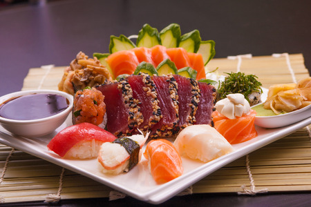 Traditional Japonese Food with rolls, sushi and sashimiの写真素材