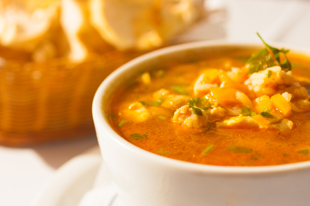 Shrimp and tomato soup meal with toast breadの写真素材