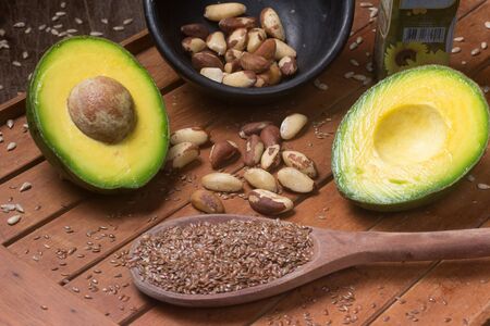 Sources of healthy fats, avocado, nuts and linseeds