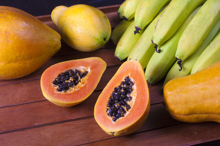 Tropical Fresh Fruits. Mamao Papaya and Bananasの写真素材