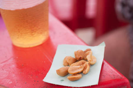 Peanuts and beer in Rio's beach barの写真素材