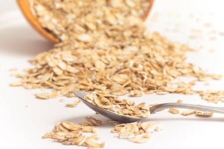 Close-up on a Oat Flakes in white background