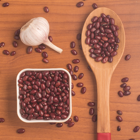 Red Kidney Beans over a wooden tableの写真素材