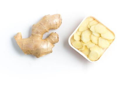 Slices of Ginger isolated on white backgroundの写真素材