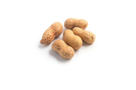 Peanut pile. Shell Seeds on white background