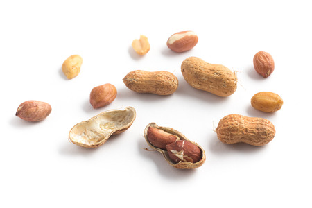 Peanut pile. Shell Seeds isolated on white background