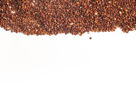 Red Quinoa seeds frame on white backgroundの写真素材