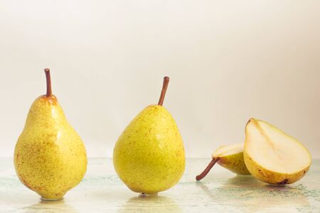 Refreshing Yellow Pear over a wet glass surfaceの写真素材