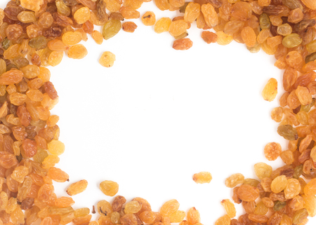 Raisins. Dried Grapes frame isolated on white backgroundの写真素材