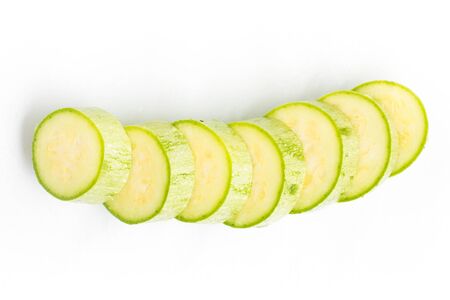 Sliced Fresh Zucchini over a white backgroundの写真素材