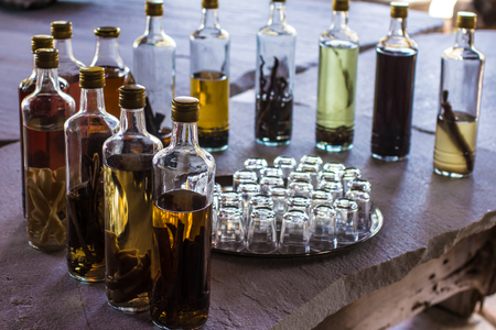 Brazilian Cachaca Bottle over a rustic tableの写真素材