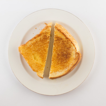 Hot cheese with toasted bread on white background
