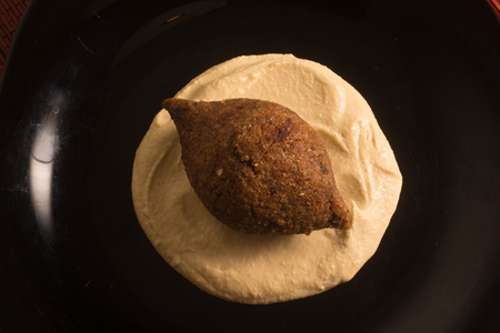 Kibbeh or Kibe, Quibe with Hummus. Close-up photoの写真素材
