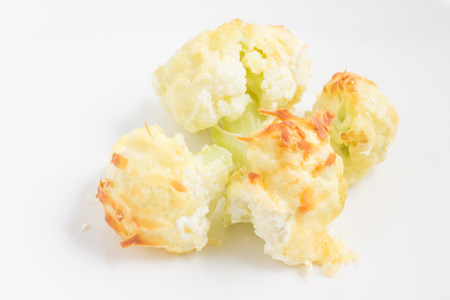 Cauliflower Gratin in a bowl isolated on white backgroundの写真素材