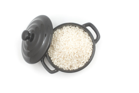 Arborio Rice in a bowl on white backgroundの写真素材