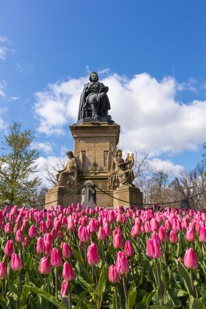 AMSTERDAM, NETHERLANDS - APRIL 13, 2019: Tulips in a Vondelpark, Amastedam on a beautiful blue day. Netherlandsのeditorial素材
