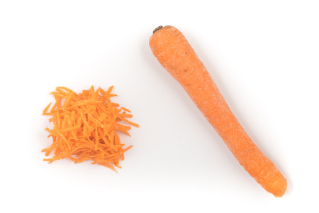 Fresh Grated carrot isolated on white backgroundの写真素材
