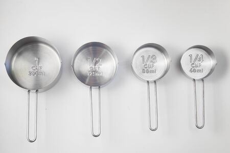Inox Measuring Cup on white background. Top Viewの写真素材