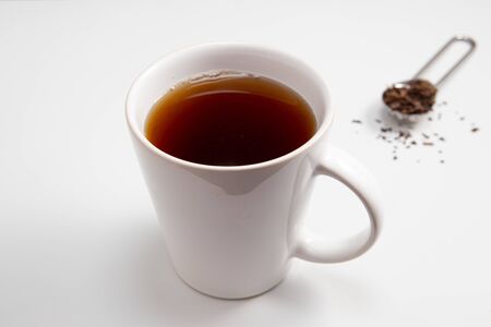 Cup of toasted Erva-Mate Tea on white backgroundの写真素材