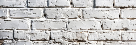 Rough white painted brick wall with textured surface. Industrial and urban backgroundの素材