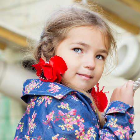 Flag Day of Independence of Ukraine. Stop WAR. Ukrainian girl in an embroidered vyshyvanka shirt with a yellow-blue flag of Ukraine. Symbols of the flag of Ukraine. Freedom. Russia terror. Kyiv.の写真素材