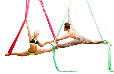 Ukrainian gymnast doing gymnastics with aerial hoop or aerial hoop in the fitness room.の写真素材