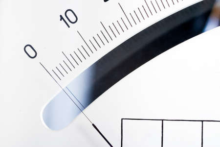 scale with an arrow on a white background. Device for measuring the strength of electric current.の写真素材
