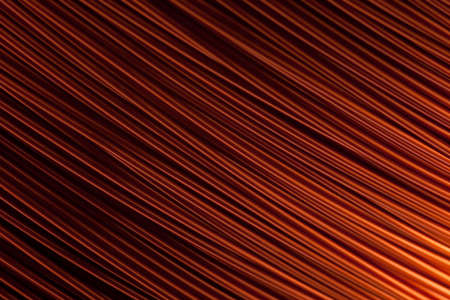 Copper wire for electronics close-up with a focus on the center and blurred edges of the right and left. Designed for the production of electronic components in the electrical industry.の写真素材