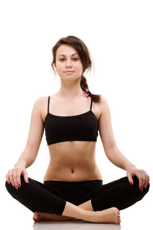 Young, fit and beautiful brunette woman in sportswear isolated on grey. Health care, diet, sport and fitness concept.の写真素材
