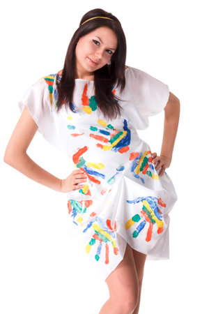 young woman with hands painted with colorful paints, ready for handprints.の写真素材