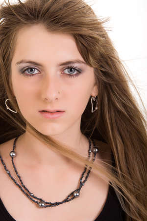 portait beautiful young woman. isolated jn whiteの写真素材