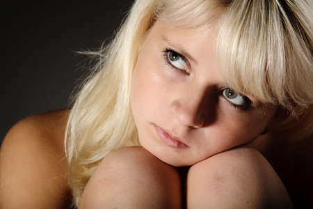 beautiful blonde with long hair half naked seducesの写真素材