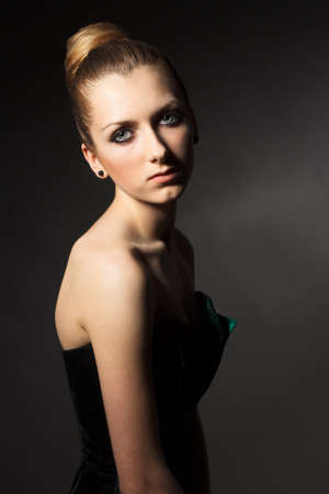 Beautiful Latina Young Woman in Cocktail Dress on Whiteの写真素材