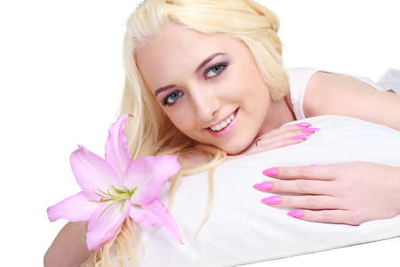 beauty portrait of a woman with a flower on white backgroundの写真素材