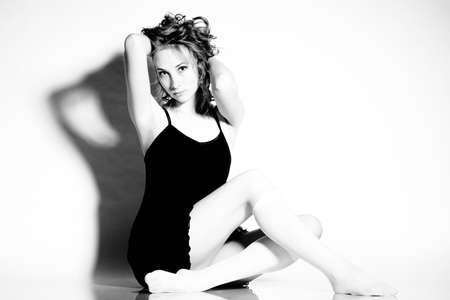 beautiful young girl in a short  dress and   stockingsの写真素材