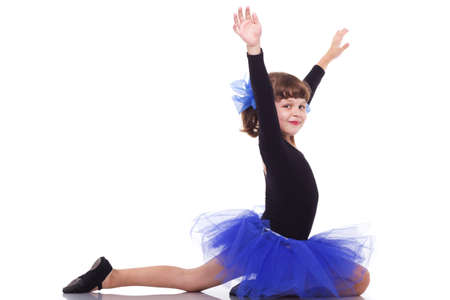 Little dancer in a beautiful blue dress, isolated on a white backgroundの写真素材