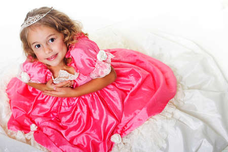 Little Beauty Queen. Young girl as magic fairy on white backgroundの写真素材