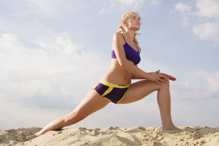 Young woman on the sand.の写真素材