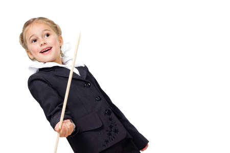 Portrait of a first grader in a school uniform on a white background.の写真素材