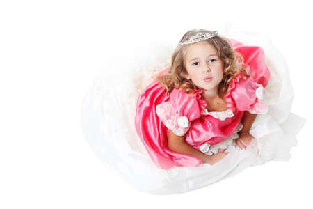 Little Beauty Queen. Young girl as magic fairy on white backgroundの写真素材