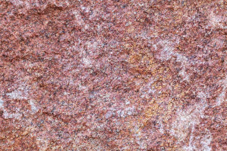 Red granite texture. Closed up details of red marble pattern background.