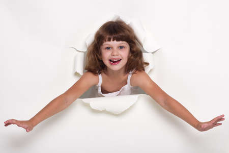 Beautiful little girl with white copy space on a white backgroundの写真素材
