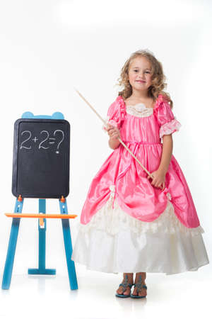 Little Beauty Queen. Young girl as magic fairy on white backgroundの写真素材