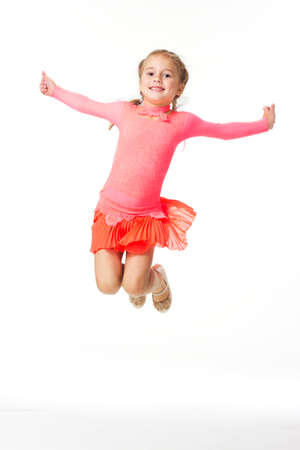 Fun Young Tap Dancer in Red. Cute schoolage girl in various dance costumes and fun poses.の写真素材