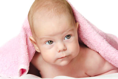 Baby girl After Bath Wrapped in Red Towel Laying and Posingの写真素材