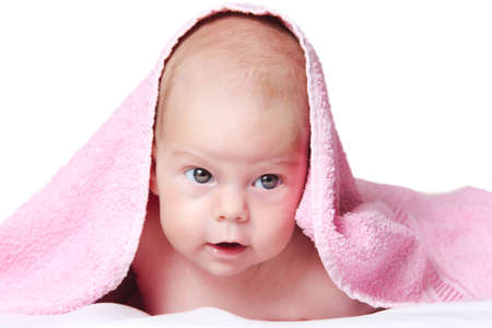 Baby girl After Bath Wrapped in Red Towel Laying and Posingの写真素材