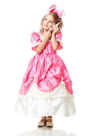 Little Beauty Queen. Young girl as magic fairy on white backgroundの写真素材