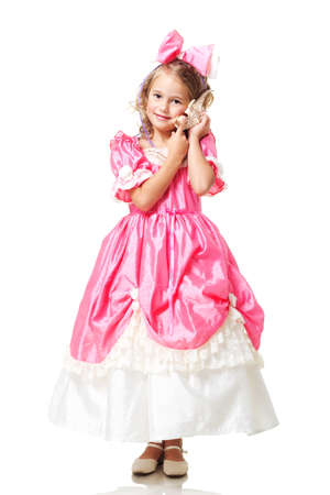 Little Beauty Queen. Young girl as magic fairy on white backgroundの写真素材