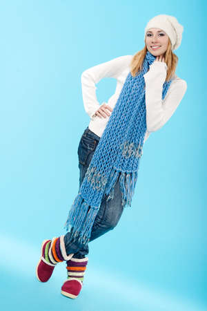 Young pretty woman with lomng hair wearing warm pulloverの写真素材