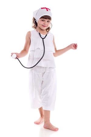Pretty medical doctor woman with stethoscope isolated on whiteの写真素材